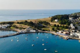 Swanagae bay from the air with sea, land and boats